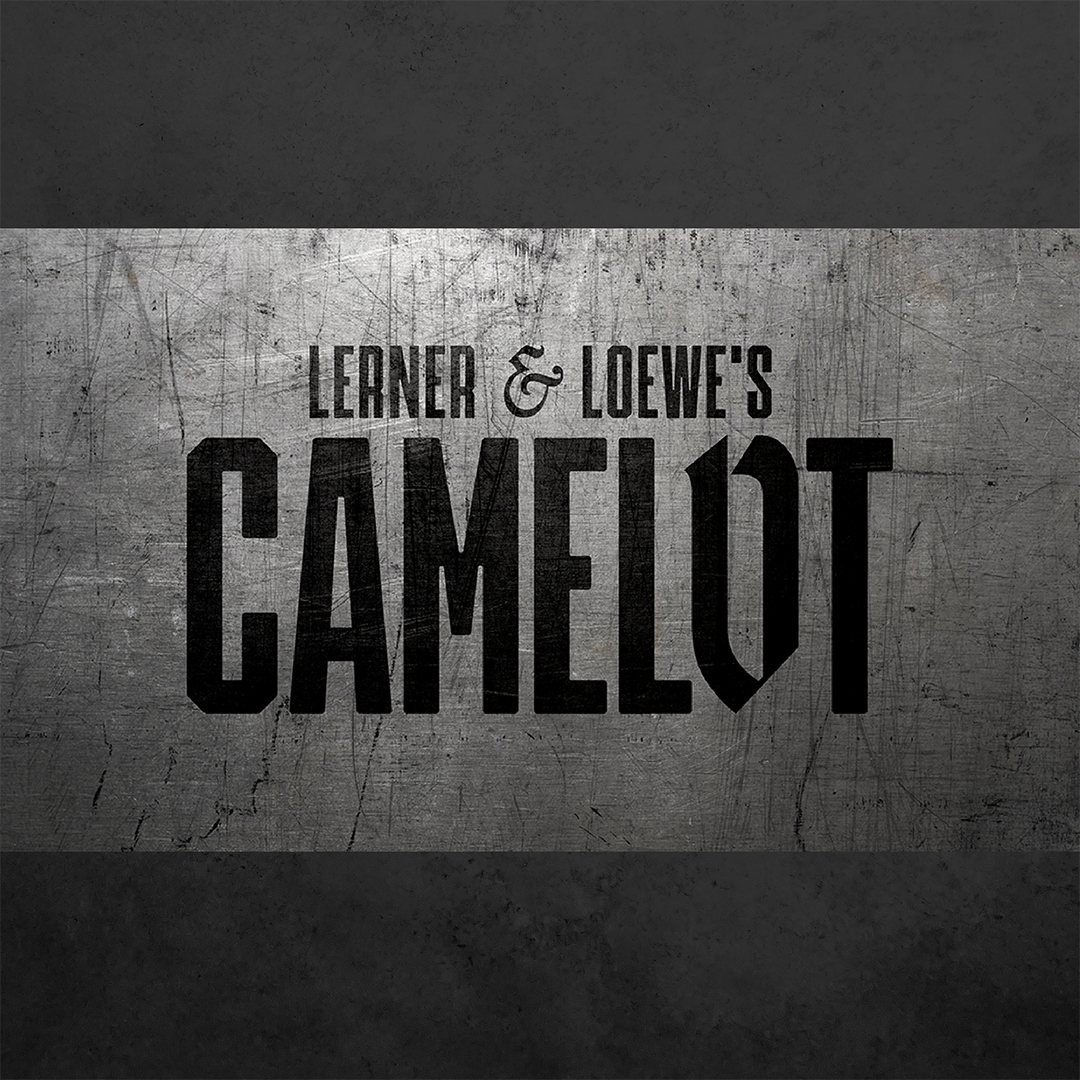 A scratched metal surface has bold black letters that read "Lerner & Loewe's Camelot".